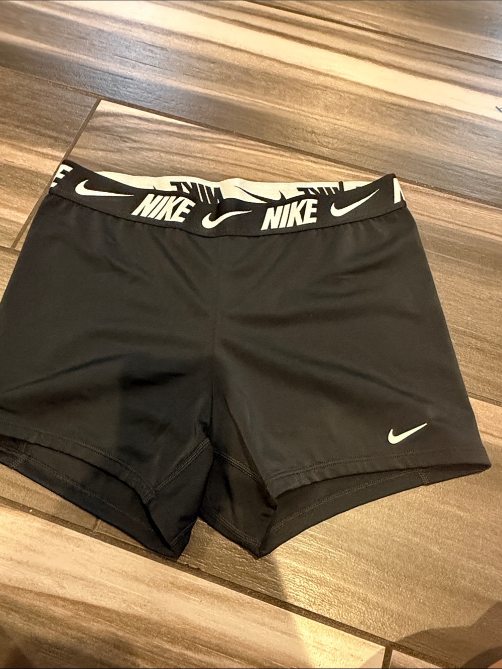 Nike Women's Black Athletic Shorts with White Logo Waistband